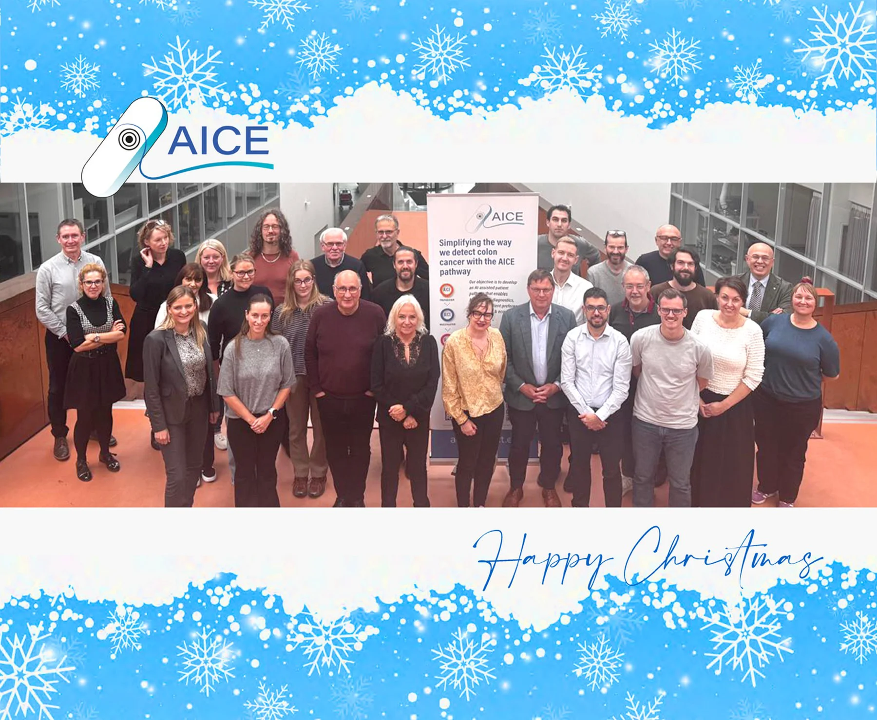 Happy Christmas with a photo of the AICE team